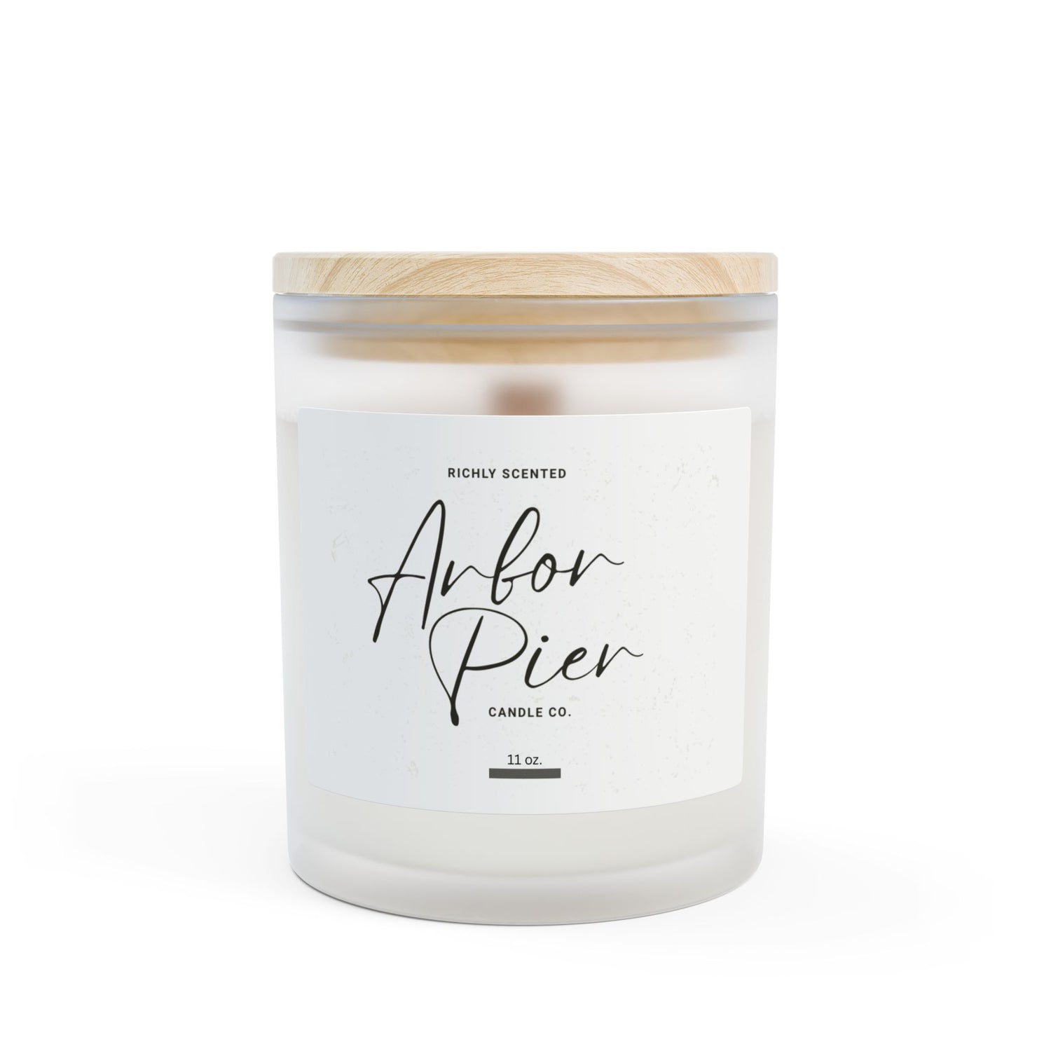 Candle with wooden lid on a white background